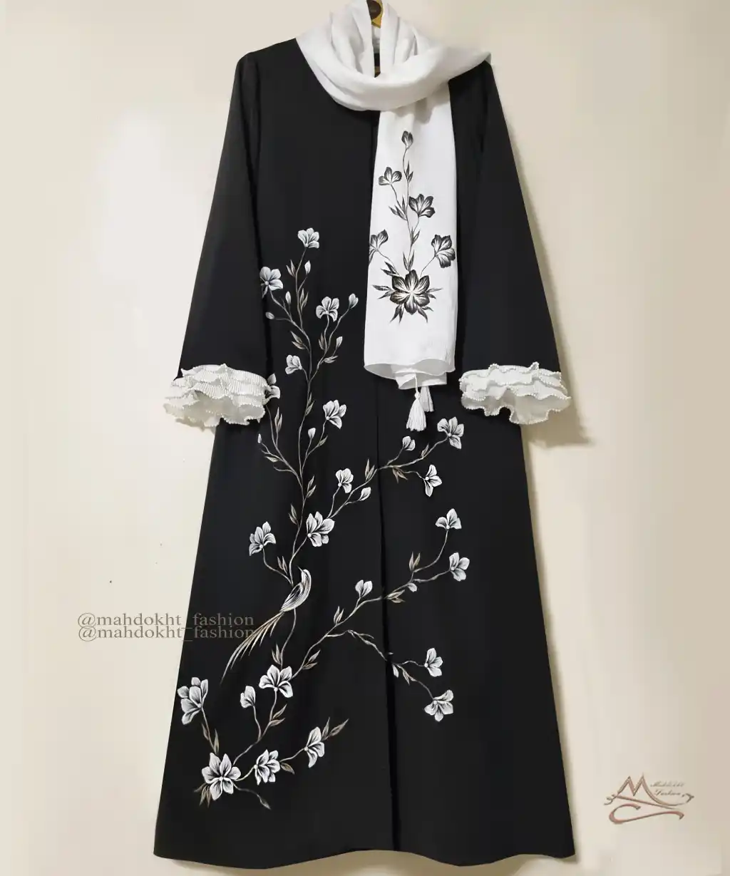 مدل مانتو مشکی - مزون مهدخت مدل مانتو مشکی مجلسی نقاشی دست گل سفید و پرنده با شال ست سفید - مزون مهدخت